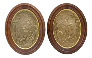 Oval Patinated Metal Wall Plaques with Cherub Decorations - A Pair