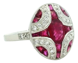 Platinum Cabochon Ruby, Diamond and Calibré Ruby Bombé Ring, Size 7.5