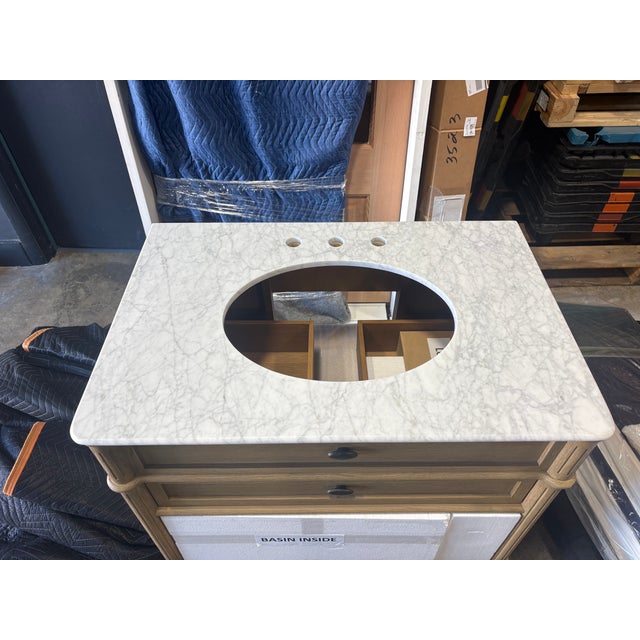 Brand new Toulouse Single Vanity from Four Hands. Just a vanity, no faucet included. Influenced by vintage European lines,...