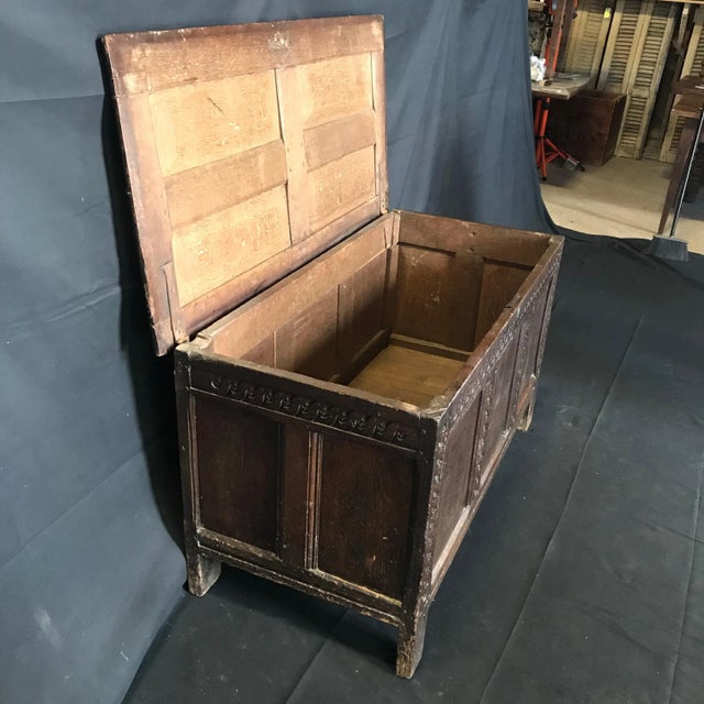 18th century paneled oak Scottish coffer, with three panels to the front, two panels to each side, raised on stile feet,...