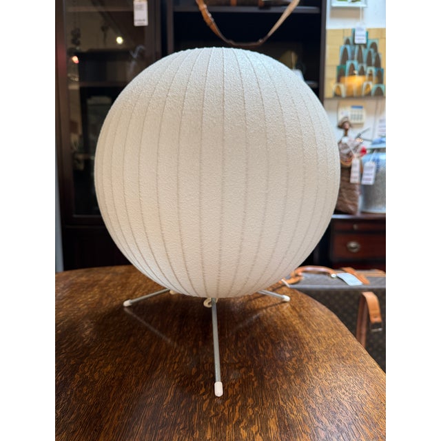 Design Plus Gallery presents the Nelson Ball Tripod Lamp from Moderica. The light is made with a steel frame then covered...