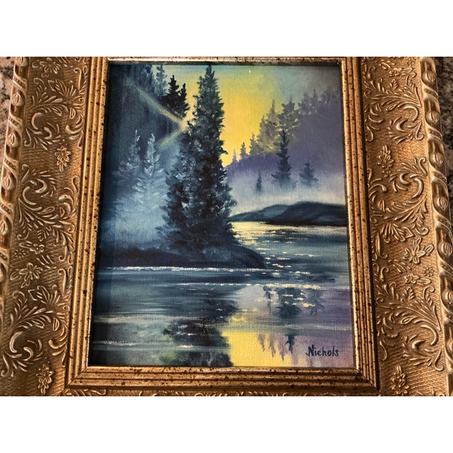 Lovely serene original painting, framed in ornate wood and gesso frame. Scene features trees and water and is depicted in...