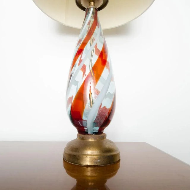 A Mid-Century modern glass lamp, Italy, circa 1960 on brass base.