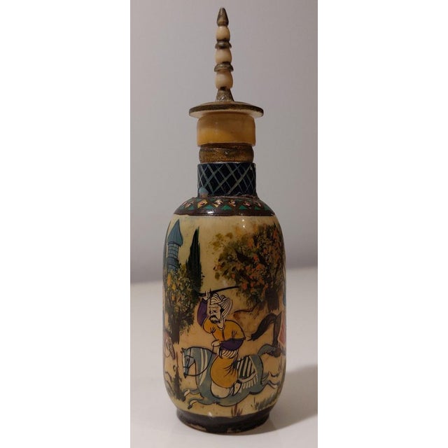 Antique Middle Eastern perfume bottle from 1910, handmade and hand-painted. This antique Ottoman Turkish perfume bottle is...