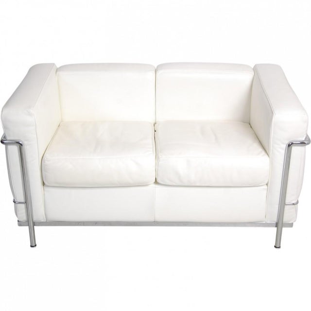 Le Corbusier LC2 2.seater sofa upholstered with white leather and with a chrome steel frame. The sofa is from around 2010...