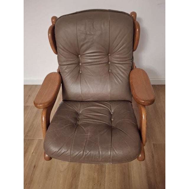 Armchair manufactured by the Dutch company Bruggink. Bruggink furniture is made of high-quality wood and material. The...