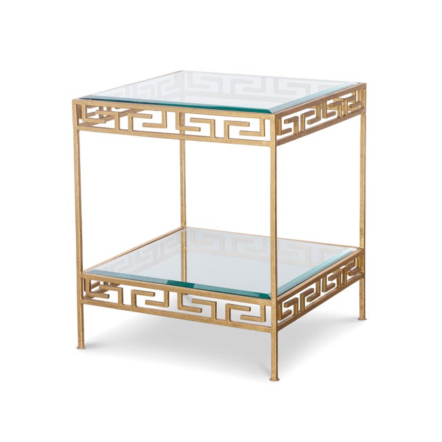 Gold leaf finish on iron base with glass top and open glass shelf at base