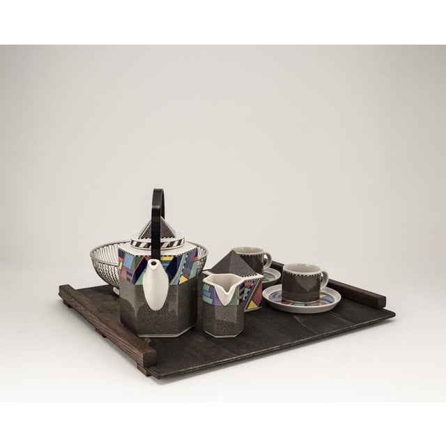 An elegant yet expressive tête-à-tête set for two, combining timeless forms with the vibrant aesthetic of postmodern...