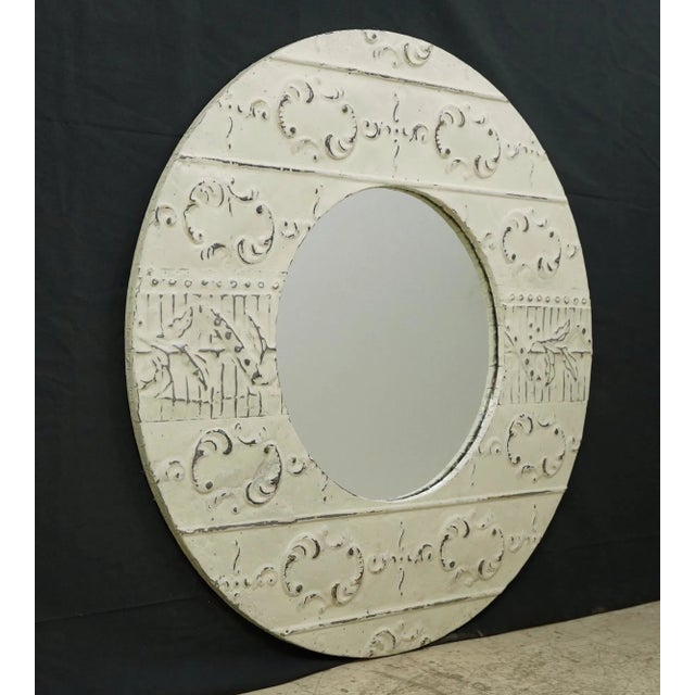 This one of kind wall mirror is handcrafted using antique 100 year old tin ceiling tiles. This mirror is ready to ship....