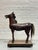 Highly expressive antique European folk horse, hand carved from solid wood and retaining its original painted surface,...