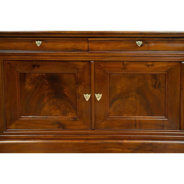 An antique Provençal sideboard in solid walnut, dating from the Louis-Philippe period in the first half of the 19th...