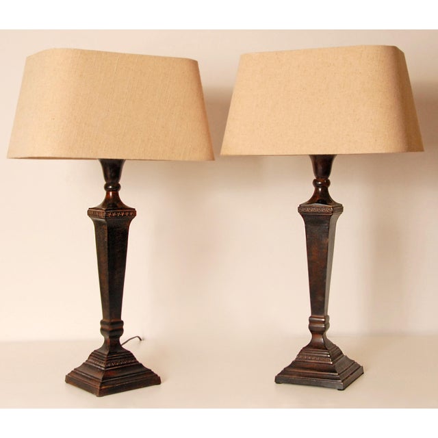 Traditional faux bronze table lamps with a classic appearance, dating from the late 20th century. Style:...