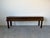 Elegant 1980s Century Furniture console or sofa table featuring a rich warm walnut-toned finish with stylish faux bamboo...