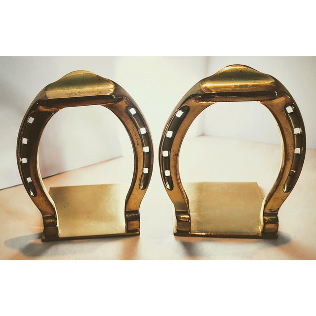These Mid Century Modern bookends are solid polished brass. They have a great shine and nice weight.