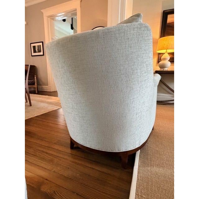 Hickory Chair lounger in a soft neutral light blue woven fabric. It is is timeless and versatile. With rolled arms, plush...
