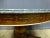 Large tripod pedestal table Charles X in marquetry. Feet claws and palmettes. Grey marble top. I have official proof of...