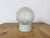 Vintage industrial ceiling or wall light made in former Czechoslovakia during the 1970s. It features a white porcelain...