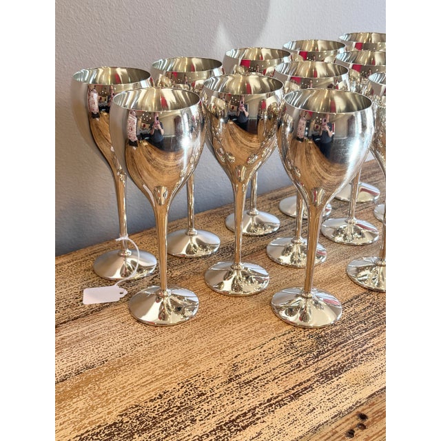 Enhance your next dinner party or holiday table setting with this spectacular, matching set of 12 vintage silver-plated...