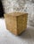 A striking sculptural side table featuring a richly patterned patchwork of hand painted squares in a warm honey toned...