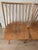 Set of four Model 7408 spindle back dining chairs designed by Leslie Diamond for Conant Ball’s iconic Modernmates line,...