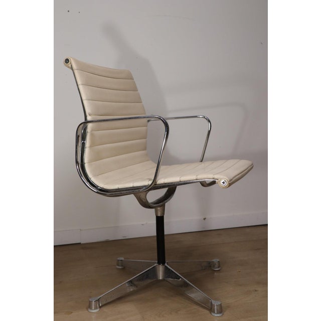Authentic EA 108 armchair, designed by Charles & Ray Eames and manufactured by Herman Miller, dating from the 1960s. An...