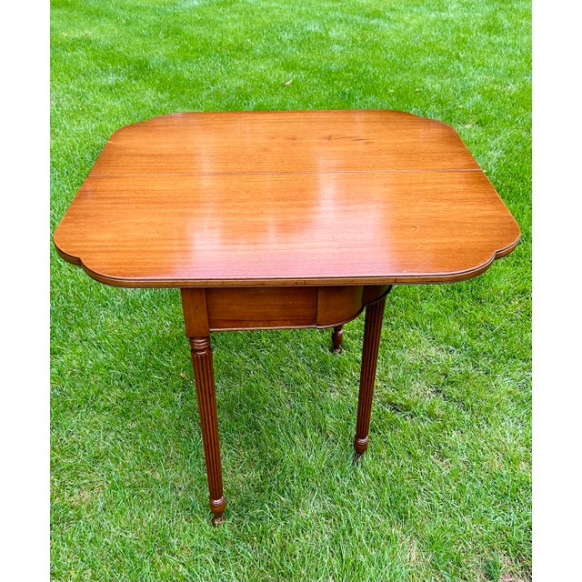 English Biggs Furniture, Mahogany, Sheraton Style, Swivel and Hinged Flip Top Mechanism, Game Table, W/Hidden Drawer, Scalloped Edges, and Fluted Legs, 1950 For Sale - Image 3 of 12