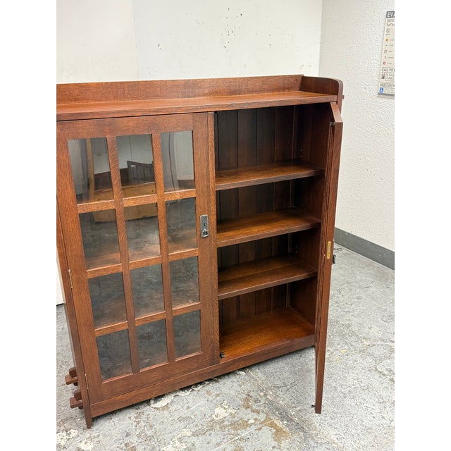 Design Plus Gallery presents a Mission Double Bookcase + Glass Doors from Stickley Furniture. This Arts and Crafts oak...