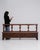A 20th century Italian bench featuring a wooden structure with an upholstered seat. The design reflects a balance between...