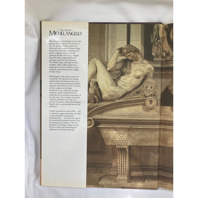 This is a Vintage Hardbound Coffee Table Book with Original Jacket that displays the works of Michelangelo di Lodovico...
