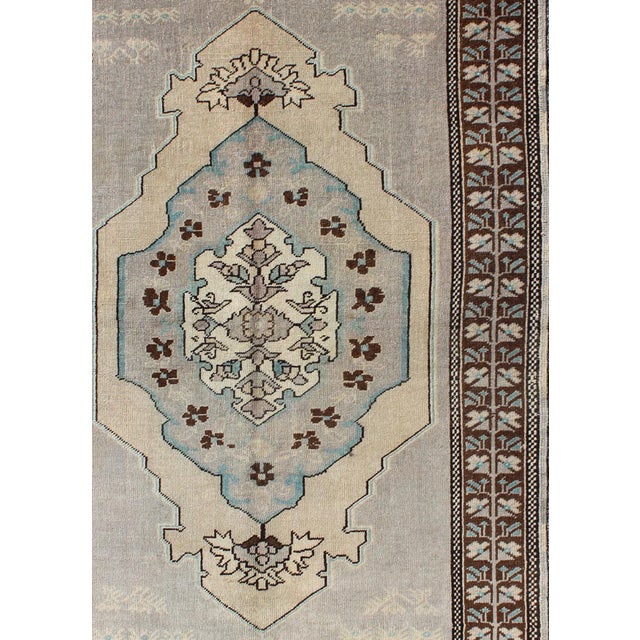 Vintage Turkish Oushak Rug in Gray, Taupe, Brown and Ivory. Keivan Woven Arts, Tu-Vey-3289. This vintage Oushak carpet is...