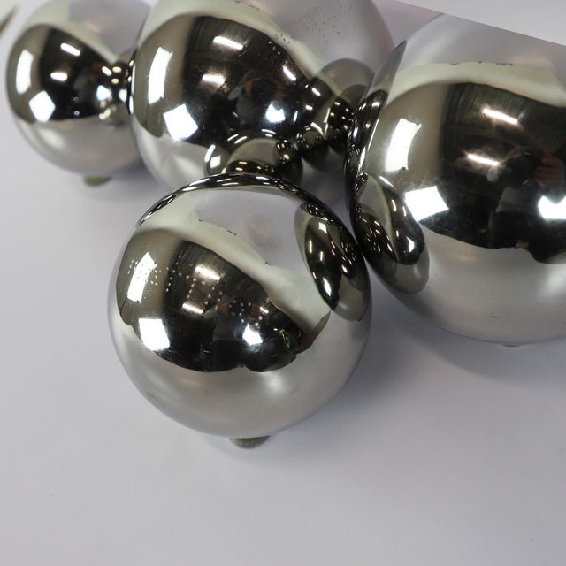 We offer this fantastic set of four spheres circa 1990 chromed metal by Diego Matthai in perfect vintage conditions. The...