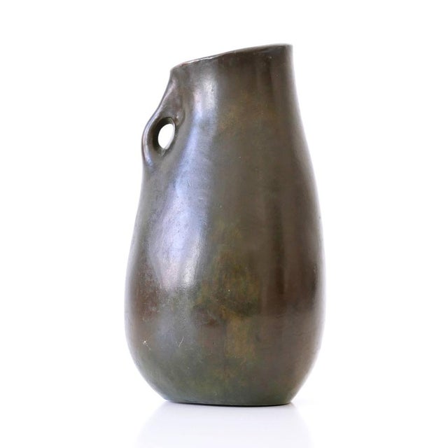 Stunning and highly decorative Mid-Century Modern bronze vase. Monogrammed: RNR. Designed and made probably in Germany,...