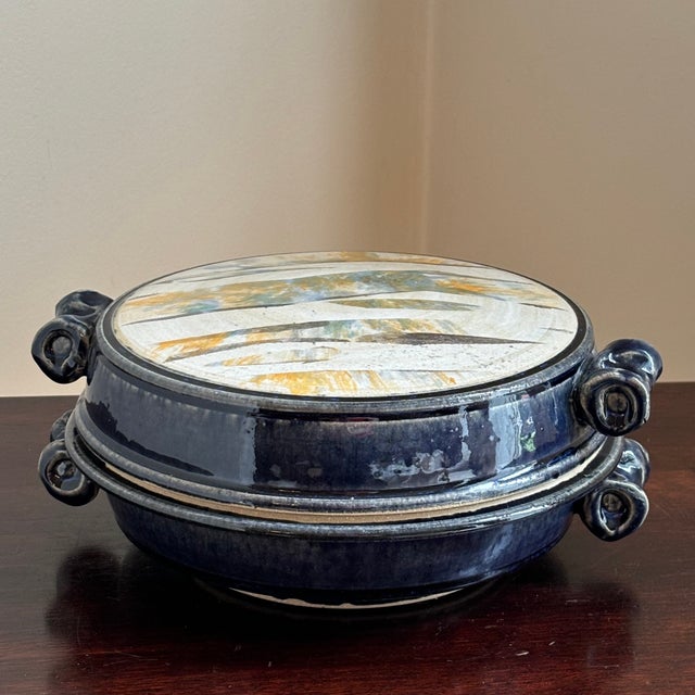 A beautiful abstract studio art pottery covered tureen from the late-20th/early-21st century. Love the the deep, midnight...