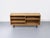 A high-quality, open lowboard crafted from oiled oak with a warm, natural look. Carefully placed solid wood corners...