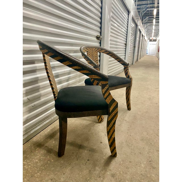 sculptural design with Art Deco influence.Typically feature ebonized details over a lighter-toned wood frame (sometimes...