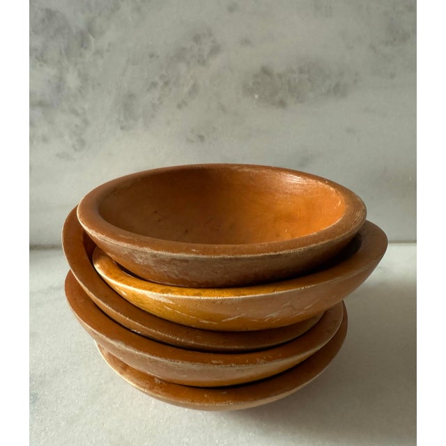 Set of 5 vintage hand turned wood salad bowls made by Munising Woodenware in Munising, Michigan. Branded on the bottom.