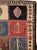 An antique Persian Bakhtiari carpet from the second quarter of the 20th century.