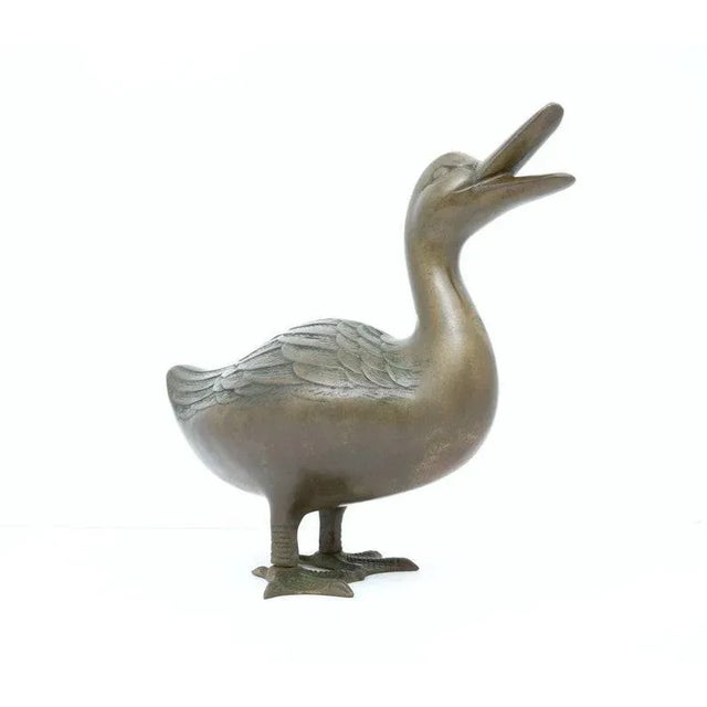 Large Vintage Brass Duck Figurine. This listing is for a beautiful large vintage brass duck figurine. Place this charming...