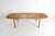A Danish mid-century modern solid wood table with removable (iron hinged) drop leaves and extension leaves. The table is...