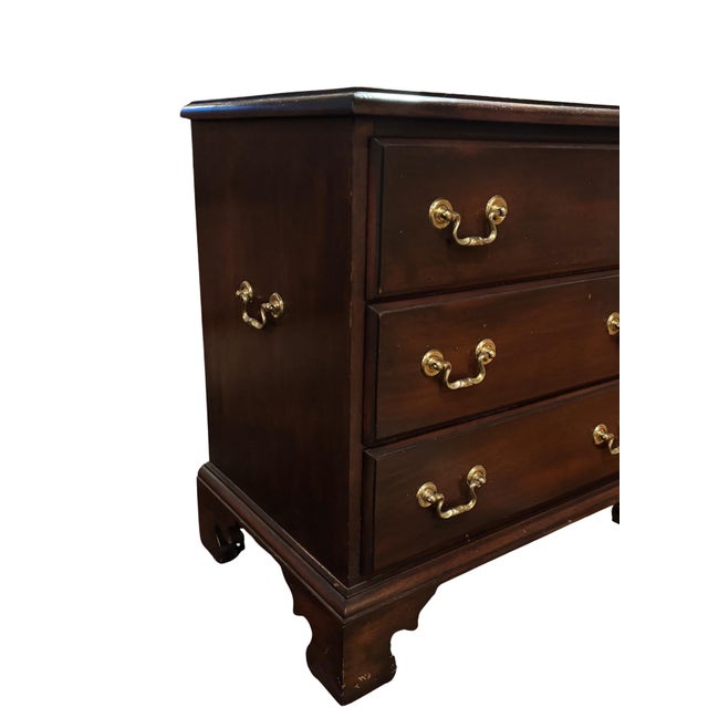 Vintage Madison Square three-drawer nightstand crafted from solid mahogany with a rich, warm brown finish. This compact...