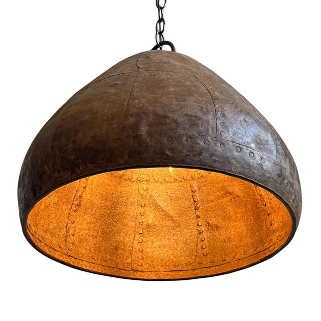 Vintage iron pendant light crafted from a hand-forged bowl from early–mid 20th century India. Such vessels were...