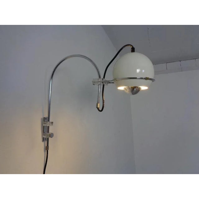 Verstellbare Wandlampe von Gepo aus den 1970er Jahren. I have official proof of authenticity such as vintage catalogs,...