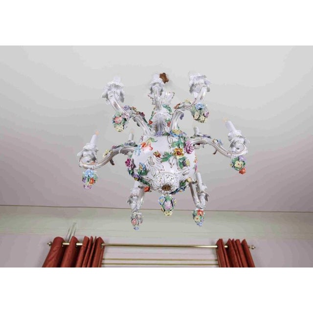 Two-story porcelain chandelier from the 1950s. Fully functional. The chandelier is hand-painted. Very good condition...