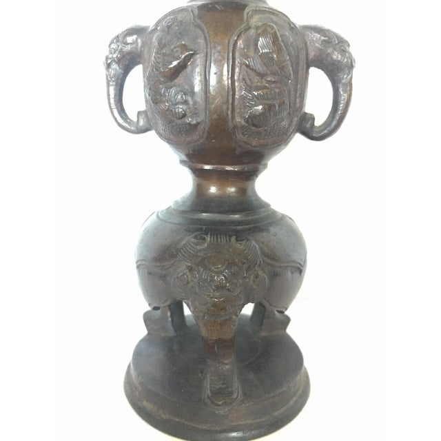 Offered is a Japanese Meiji period [1868-1912] bronze pricket candlestick. The spire top on dished drip-tray over pierced...