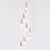 This cascading pendant was manufactured by Raak Amsterdam in circa 1970. It has nine brushed copper colored pipes and has...