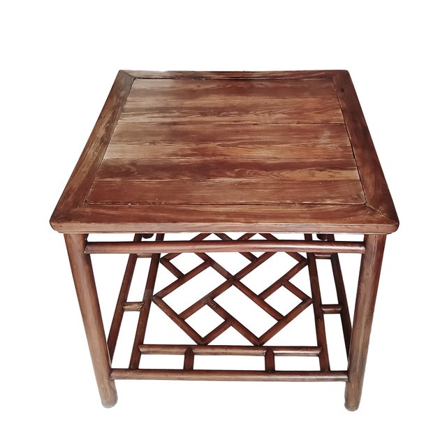 A superb square center / side table, Ming style, late 18th Century. Suzhou, China. Hand-crafted in hardwood, stained in a...