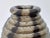 Impressive mid century vase with hand-built stacked rings and balls. Measuring over 14" tall, this piece is a daring...