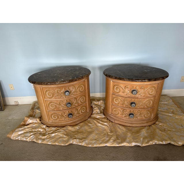Elevate your bedroom layout with this exceptional, rare pair of oval 3-drawer nightstands from Henredon’s celebrated...