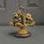 The Antique Cast Iron Yellow Flower Basket Doorstop is a charming and functional decorative piece made of durable cast...