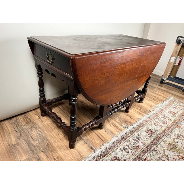 This really great English William & Mary gateleg table dates to the early 18th century and represents one of the most...